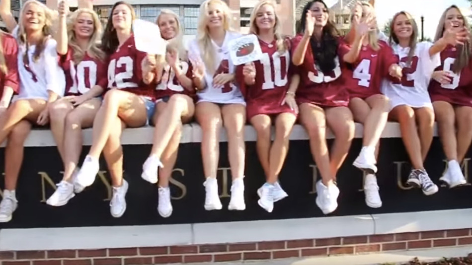 A screen shot of Alpha Phi's video of them on a wall. 